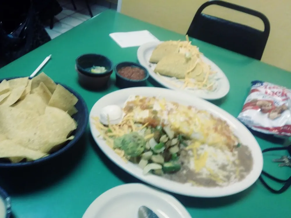Burito Beans Rice & 4 Tacos